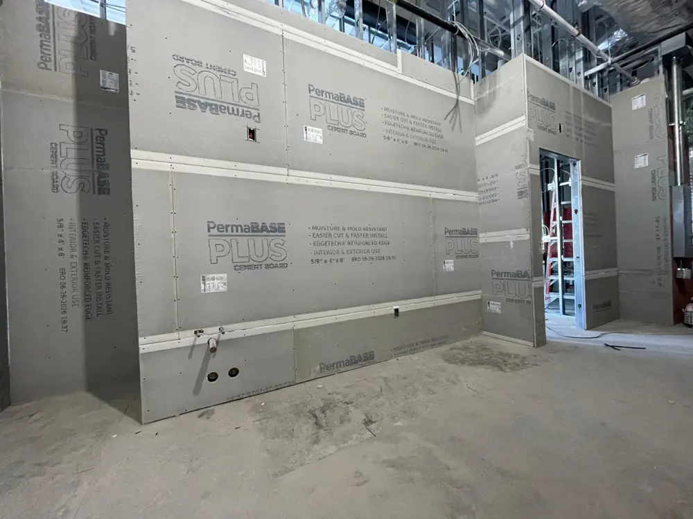 Cement board walls in a commercial build