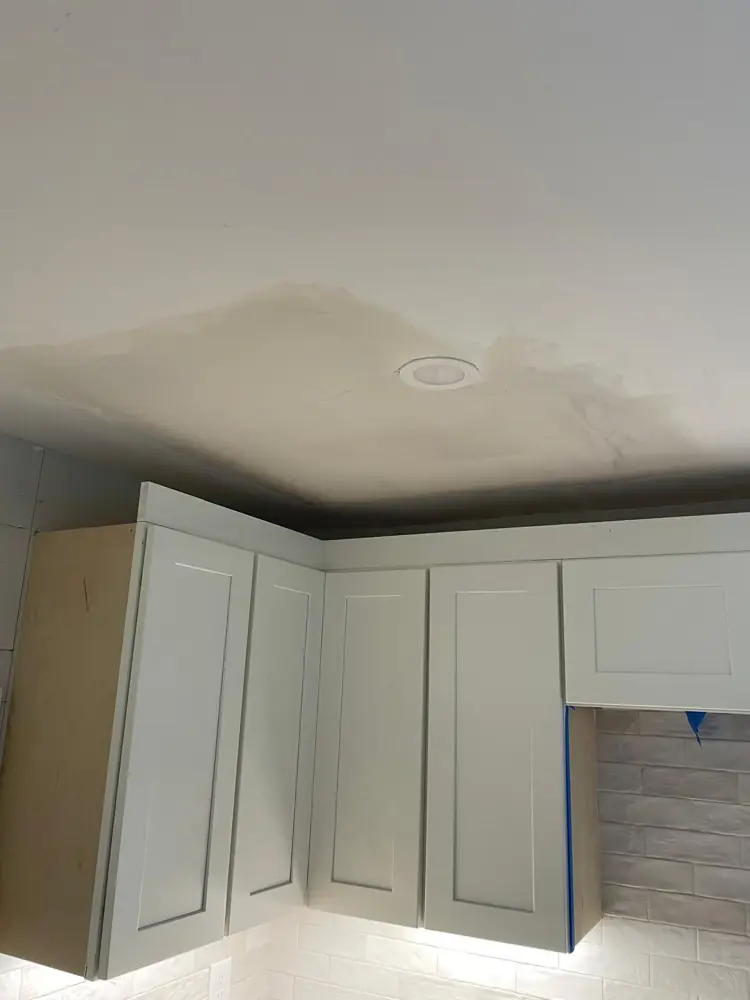 Smooth finished ceiling over new cabinets
