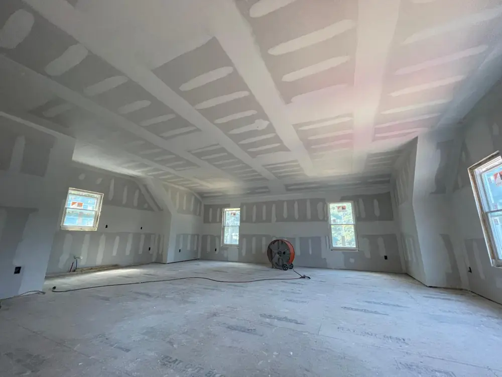 Large attic room with taped and mudded seams